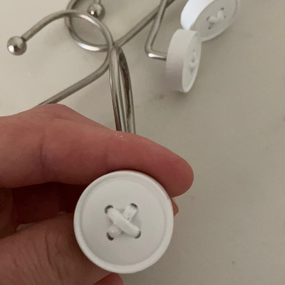 Shower curtain hangers